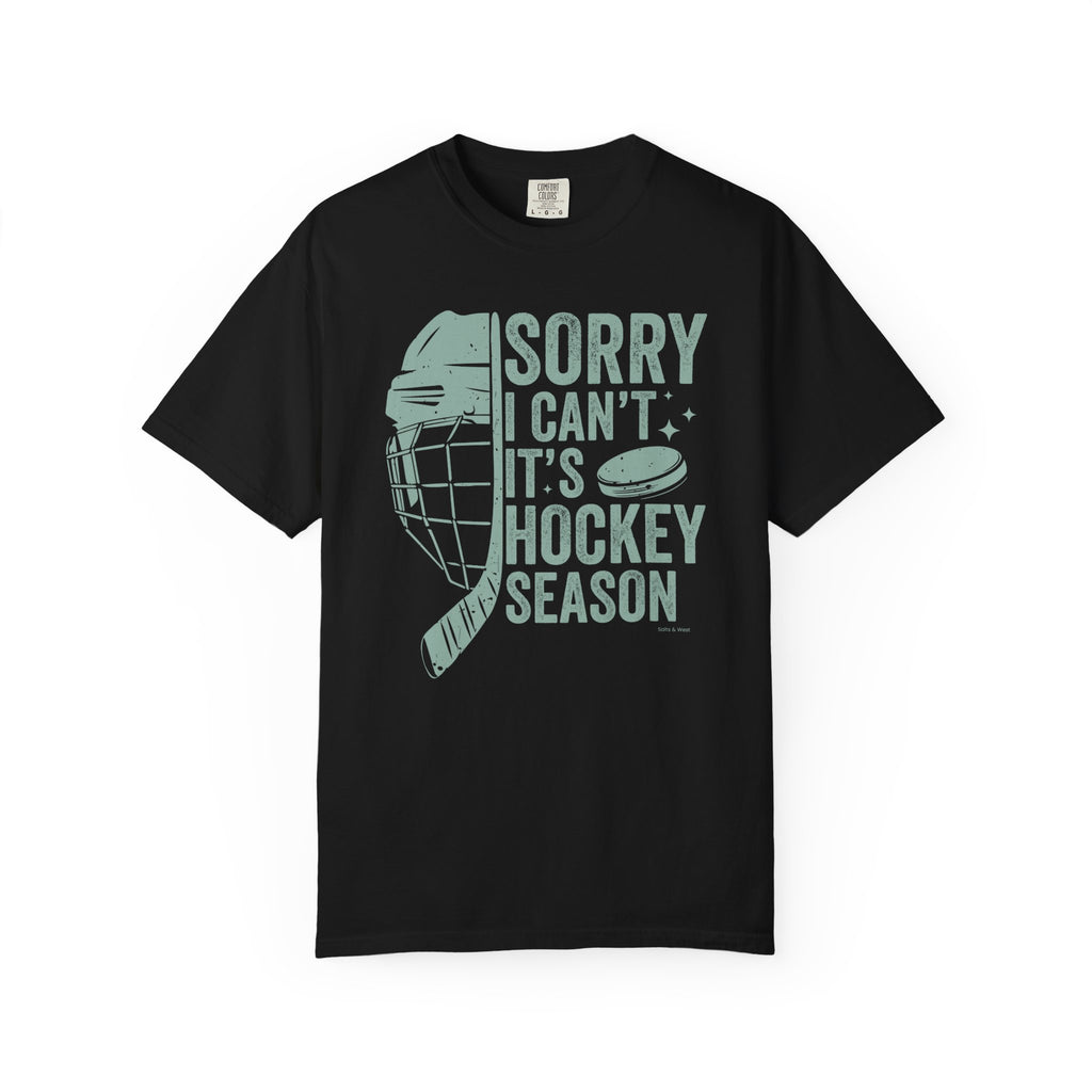 Black t-shirt with hockey-themed graphic and text on a white background