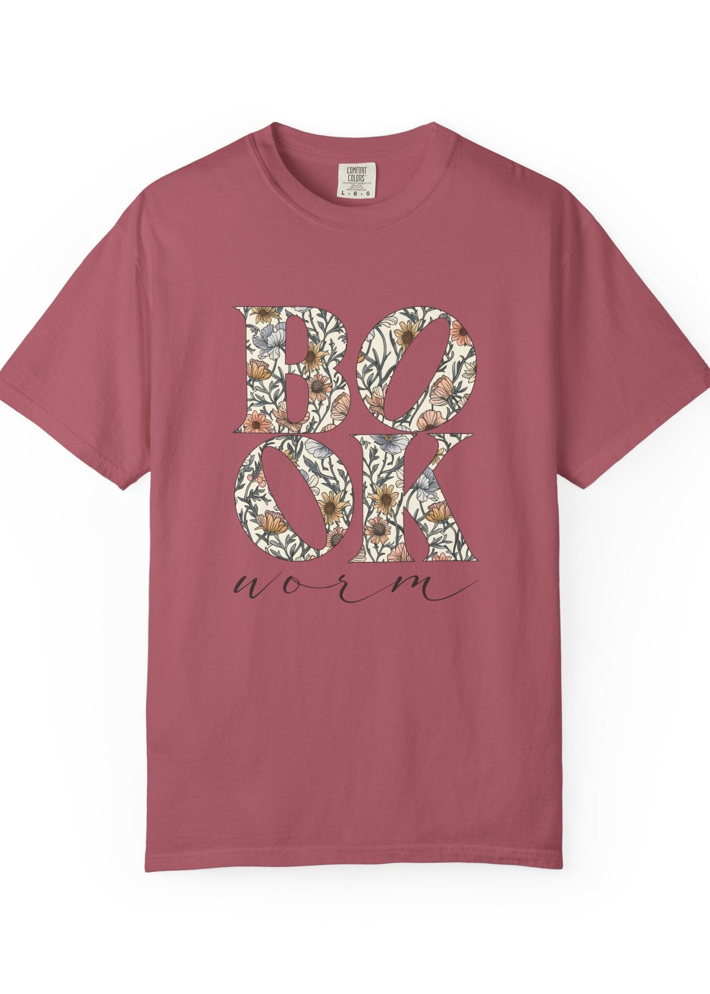 Mauve t-shirt with floral 'BOOKworm' design on a white background
