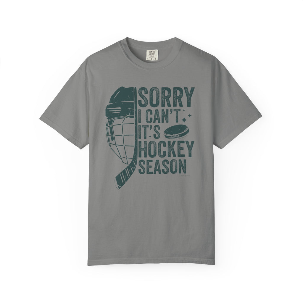 Gray t-shirt with hockey-themed graphic and text on a white background