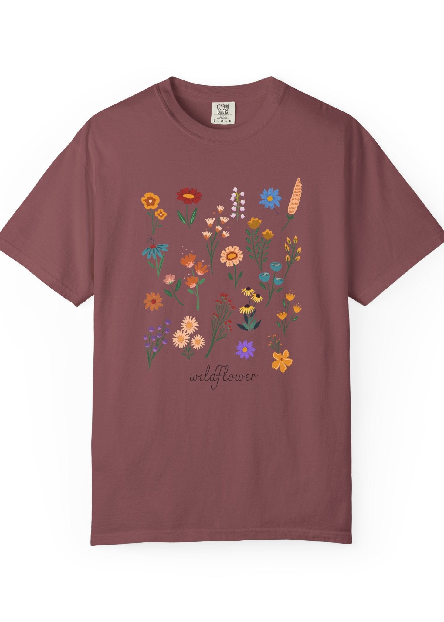 Maroon 100% cotton t-shirt with colorful floral design and 'wildflower' text on a white background