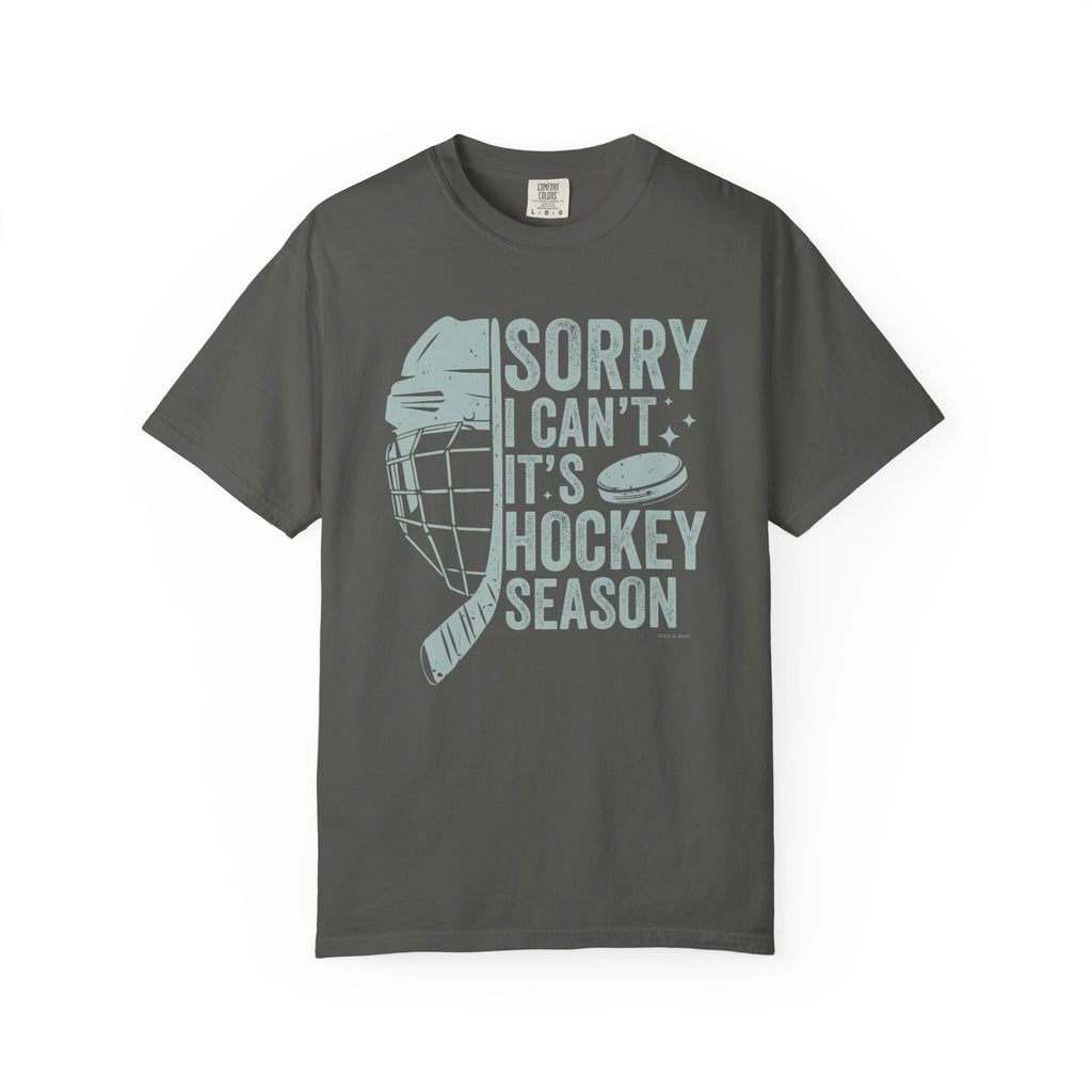 Gray t-shirt with hockey-themed graphic and text on a white background
