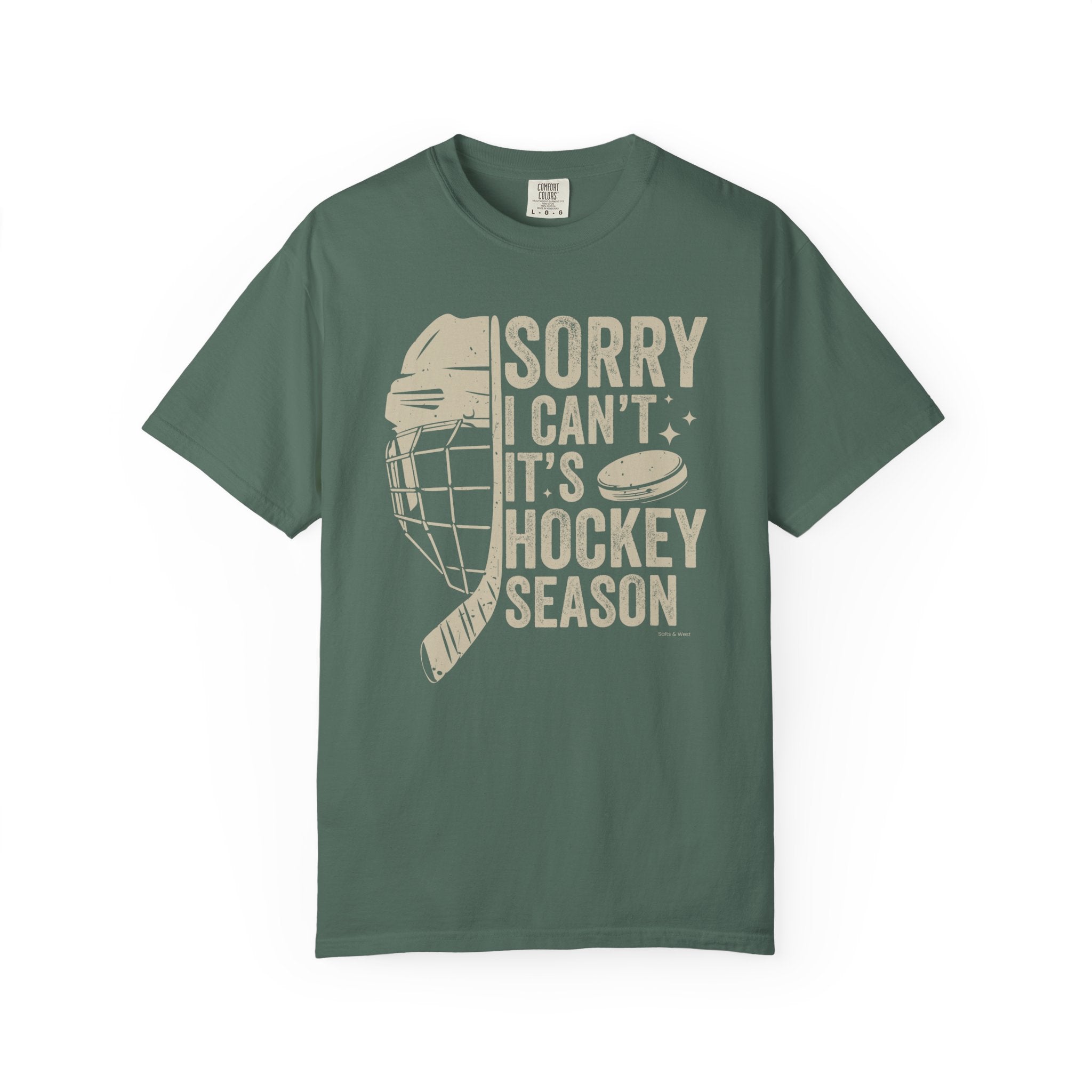 Green t-shirt with hockey-themed graphic and text on a white background