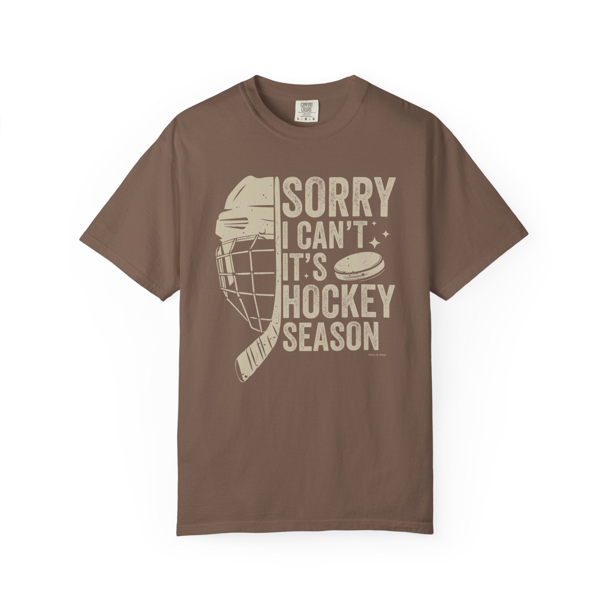 Brown t-shirt with hockey-themed graphic and text on a white background