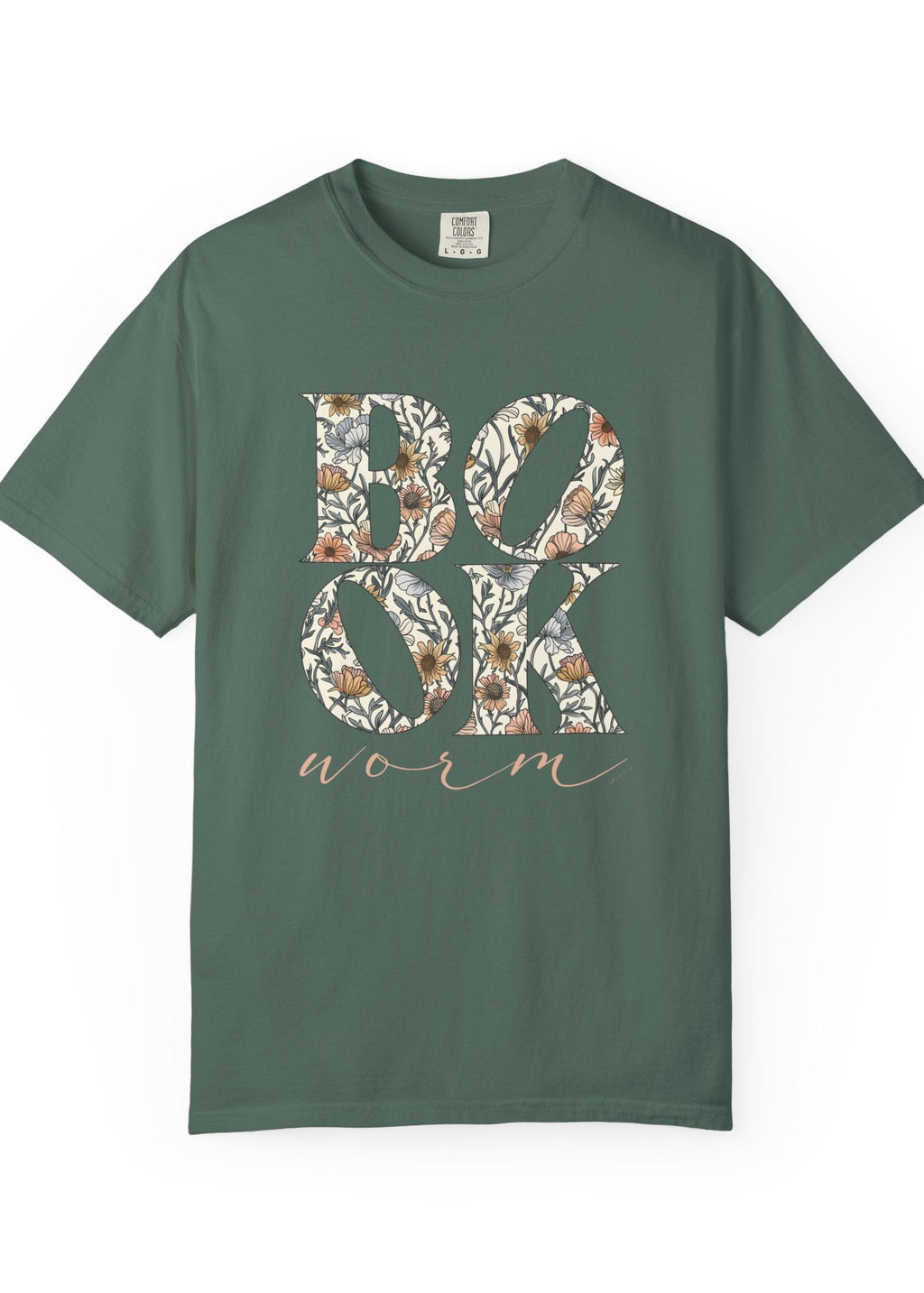 Green t-shirt with 'BOOK worm' text and floral design on a white background