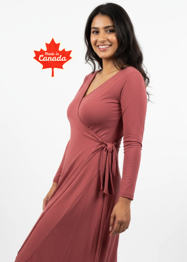 Woman wearing a pink dress with a 'Made in Canada' logo on a white background