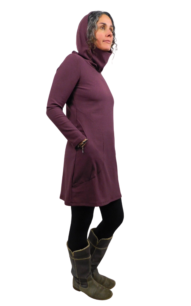 Person wearing a long purple bamboo clothing hoodie with a hood on a white background